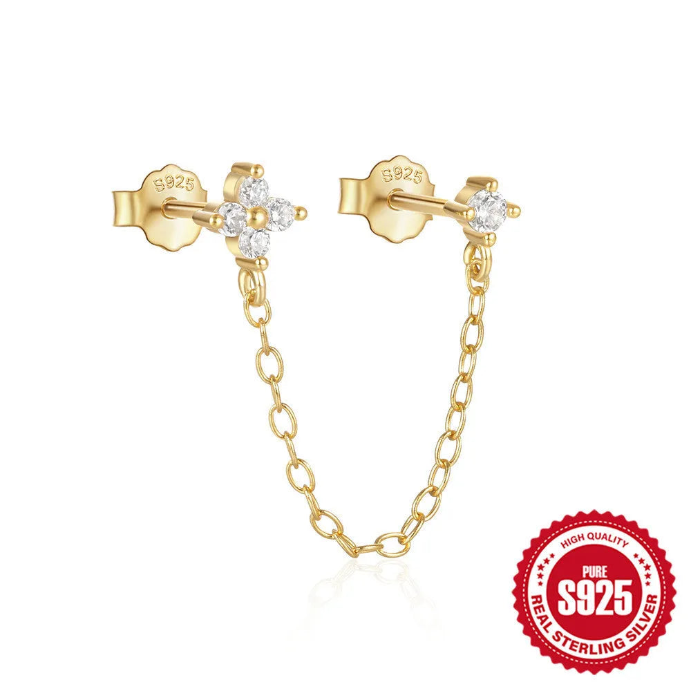 S925 sterling silver stud earring with a diamond-shaped flower, dangling tassel, and chain detail in a golden colour.