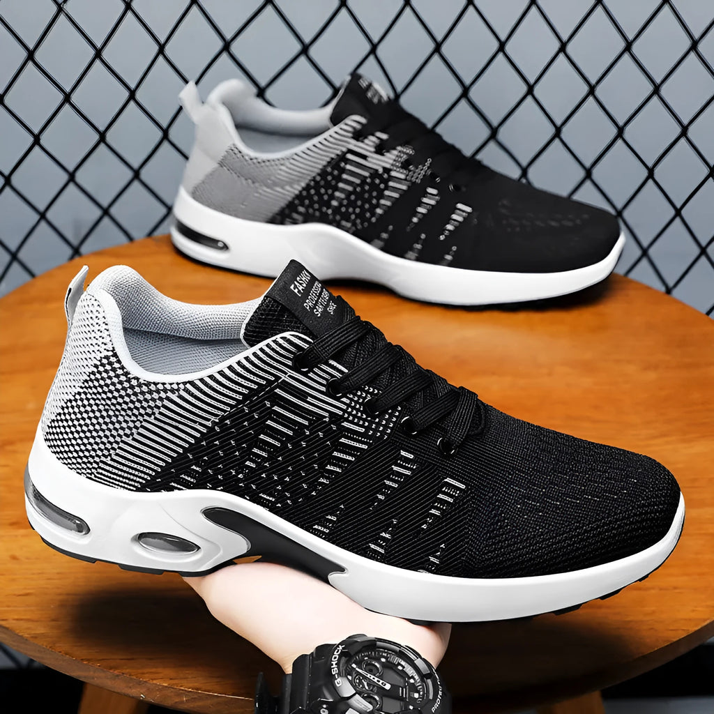 Men's low-top casual sneakers in black and blue with Flyknit mesh upper and lace-up front.