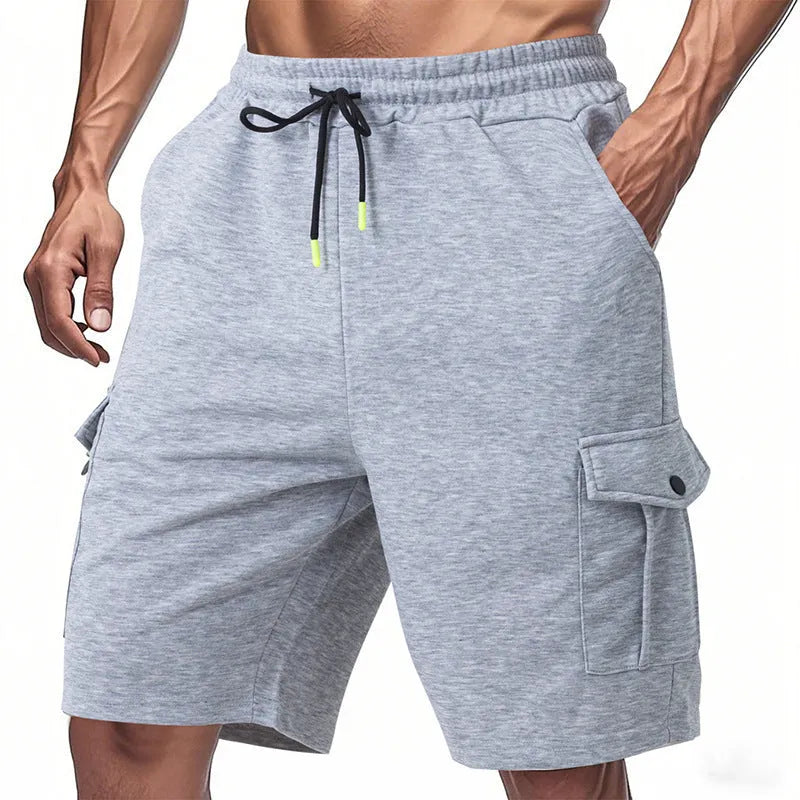 Heavy fabric cargo shorts with multiple pockets in loose sports style showing light grey colour option