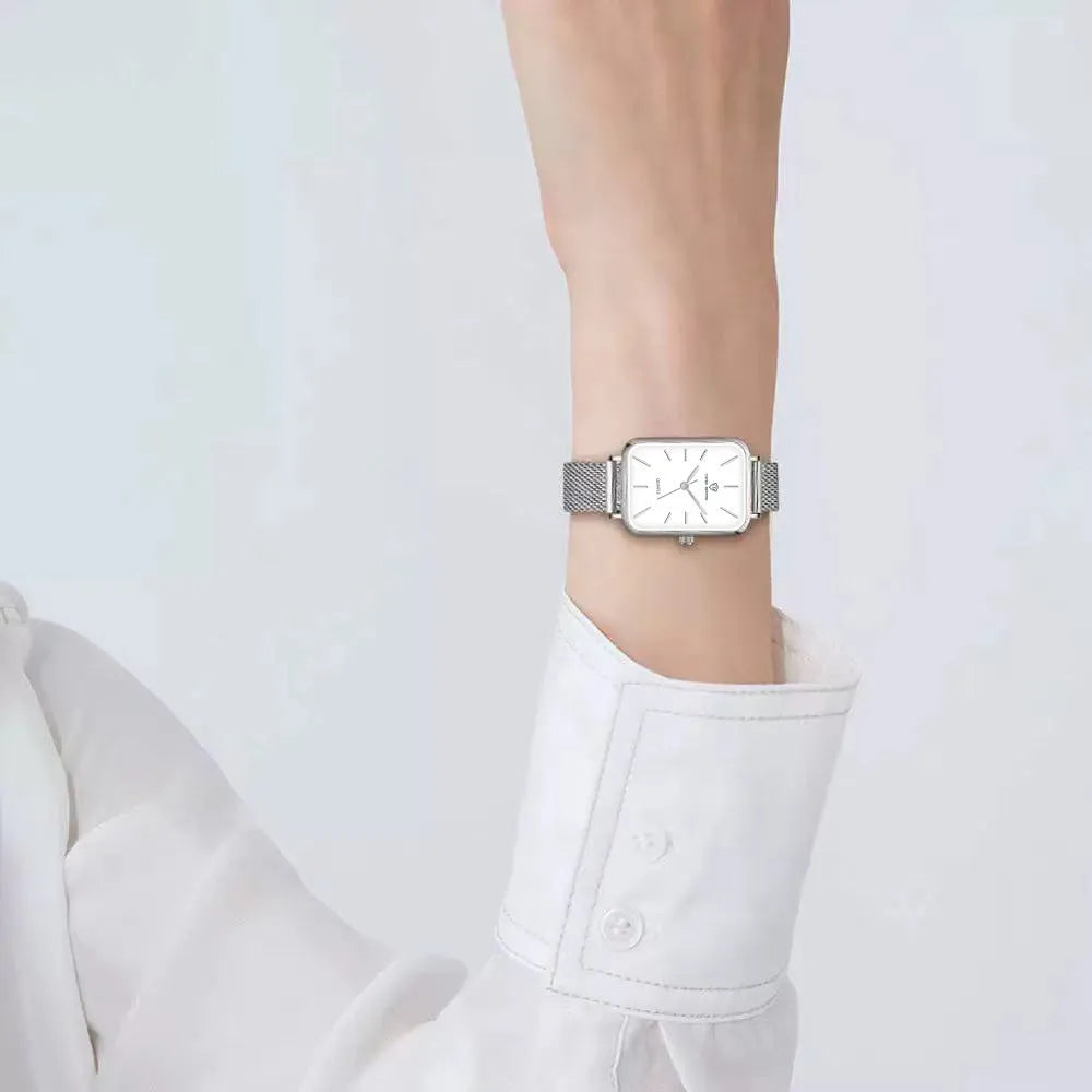 Women's waterproof quartz watch with woven steel strap in rose gold or silver.