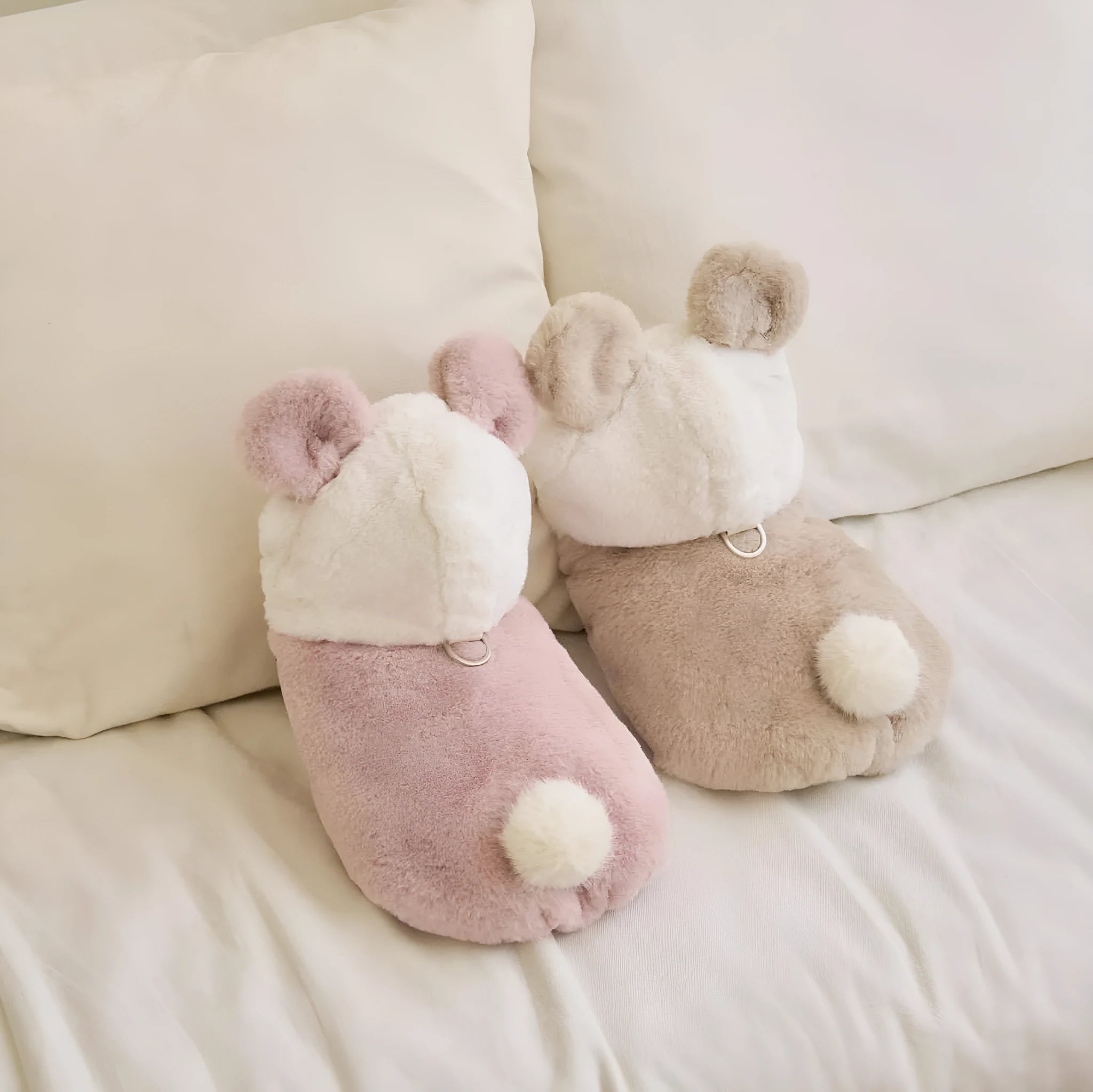 Light pink dog winter coat showing casual style and secure fastening
