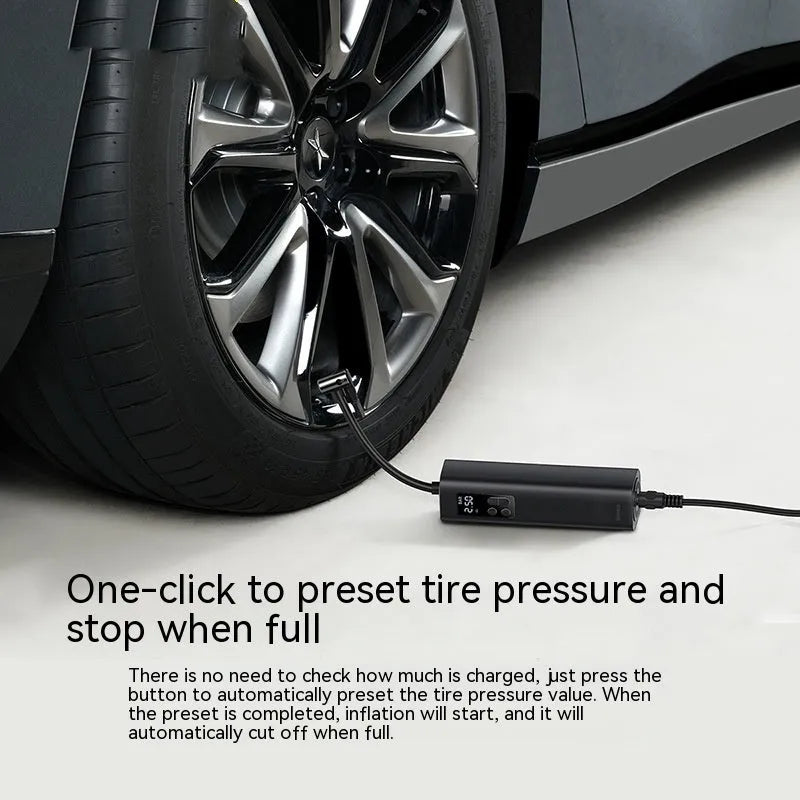 Black digital car tyre inflator with LCD display showing 18cm length scale