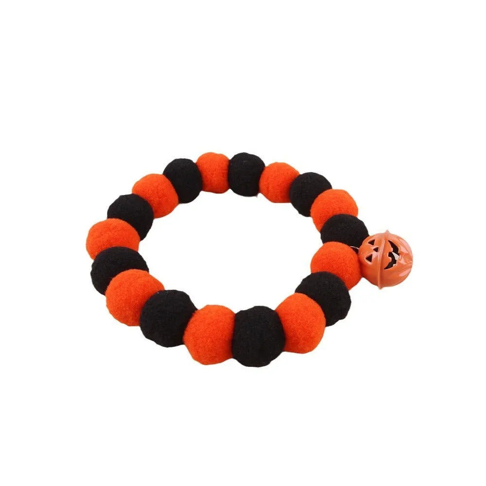 Halloween cat collar with naughty pumpkin design on adjustable nylon webbing in three sizes