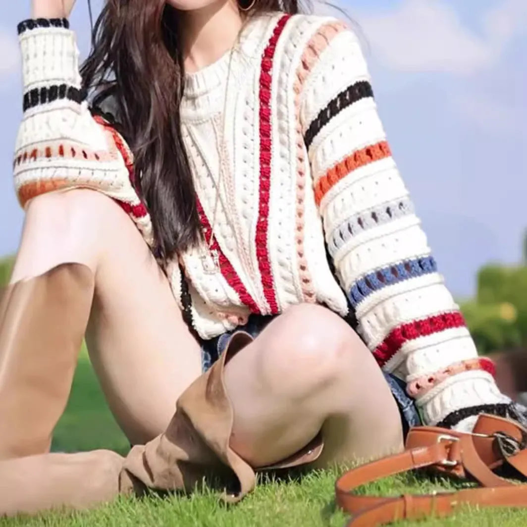 Rainbow striped round neck pullover sweater with batwing sleeves in loose fit casual style