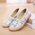 Women's flat heel cloth shoes in ethnic style with colour stitching and a shallow mouth design.