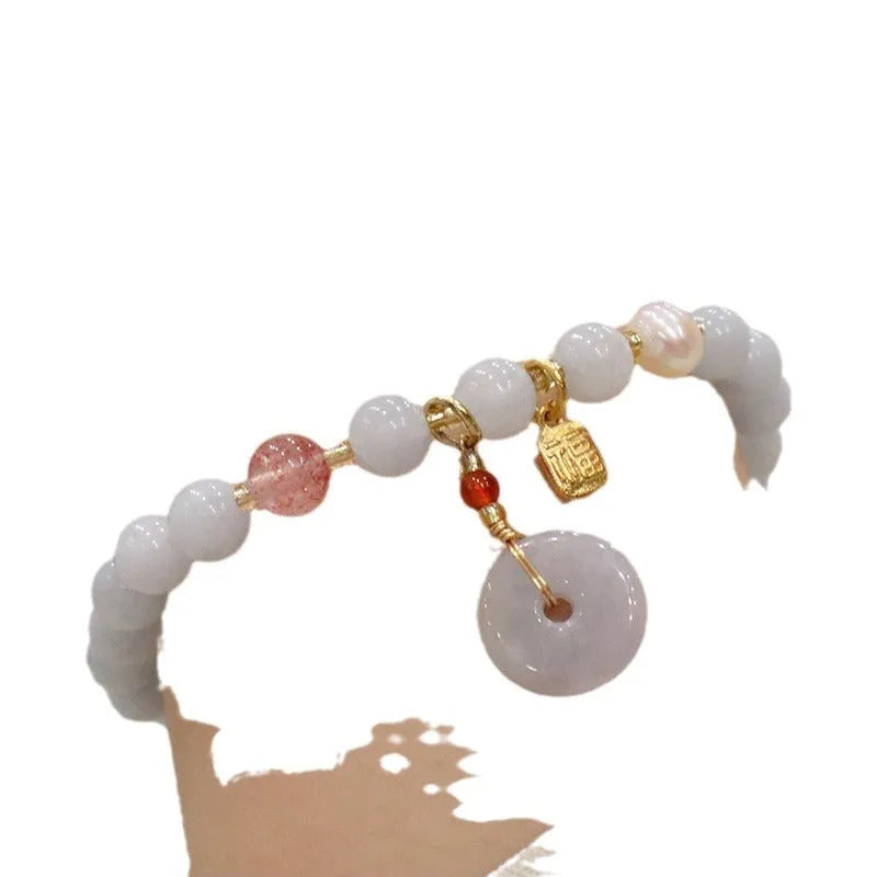 Aquamarine crystal bracelet with gold-plated climbing cat charm for women