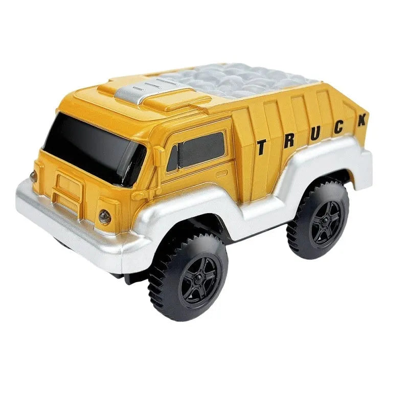 Red electric fire truck rail car with front and rear lights on toy track