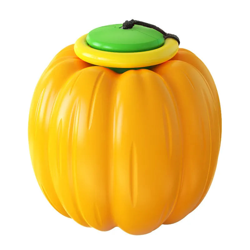 Green, orange, and yellow plastic pumpkin-shaped dog chew toy with squeaker.