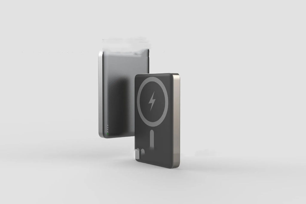 Ultra-thin magnetic wireless power bank with alloy shell, tarnish finish, 8mm thick, on a desk