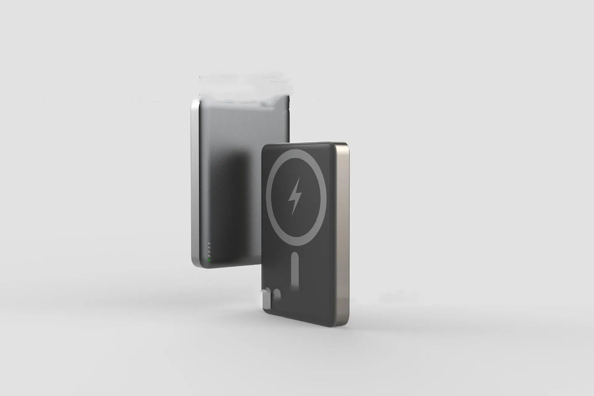 Ultra-thin magnetic wireless power bank with alloy shell, tarnish finish, 8mm thick, on a desk