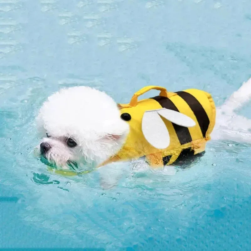Green dog life jacket with reflective trim and adjustable belly straps for swimming safety