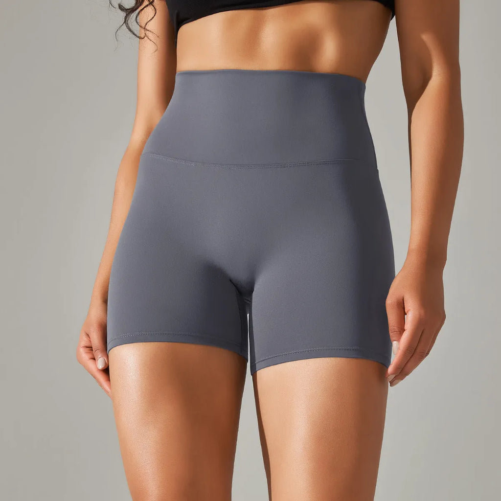 Dark green high waist women's fitness tights made from nylon spandex fabric.