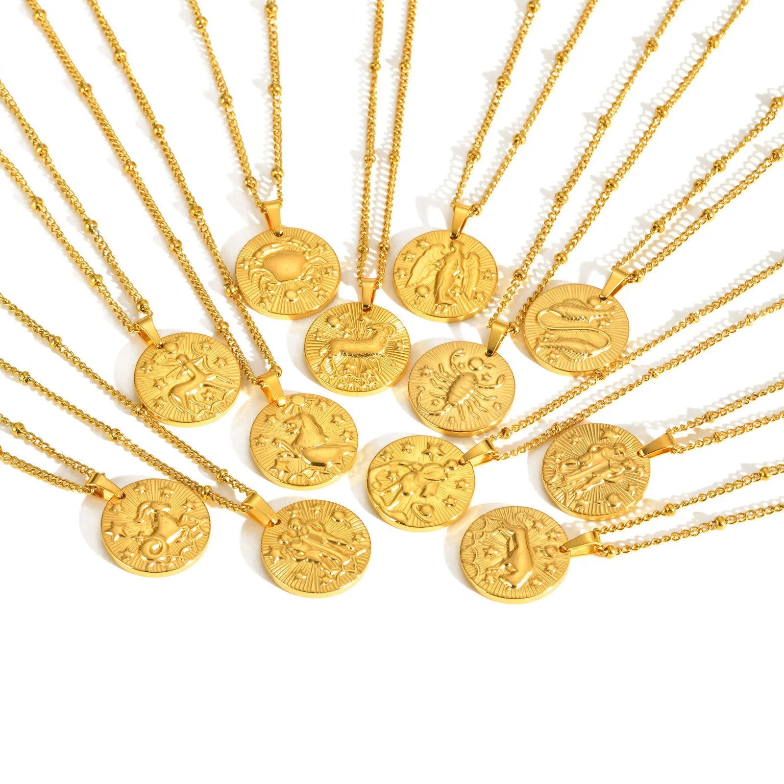 Stainless steel zodiac necklace with round pendant showing embossed constellation design on a cross chain.