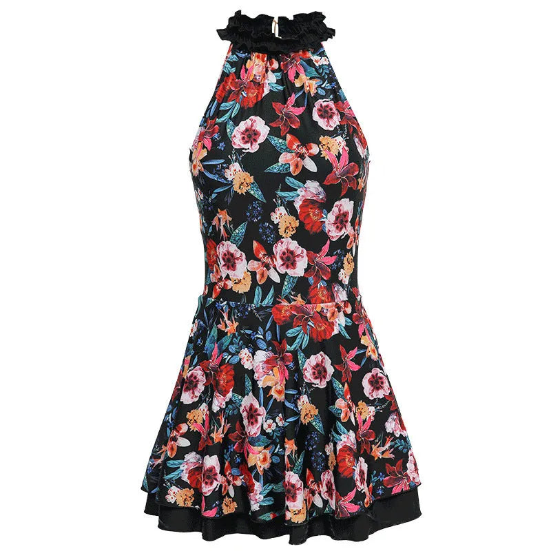 Black printed conservative one-piece swimsuit for women on a hanger.