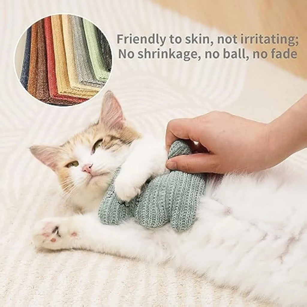 Cyan knitted plush cat toy with organic catnip and bell for chew-resistant play.