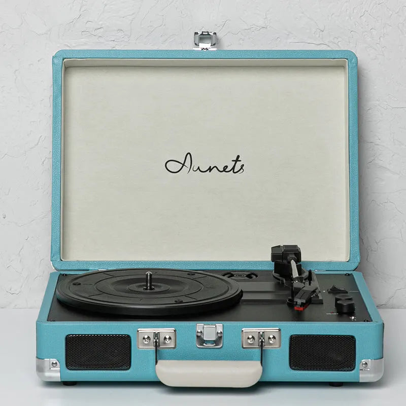 Retro phonograph Bluetooth record player in leather suitcase case with turntable and controls
