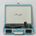 Retro phonograph Bluetooth record player in leather suitcase case with turntable and controls
