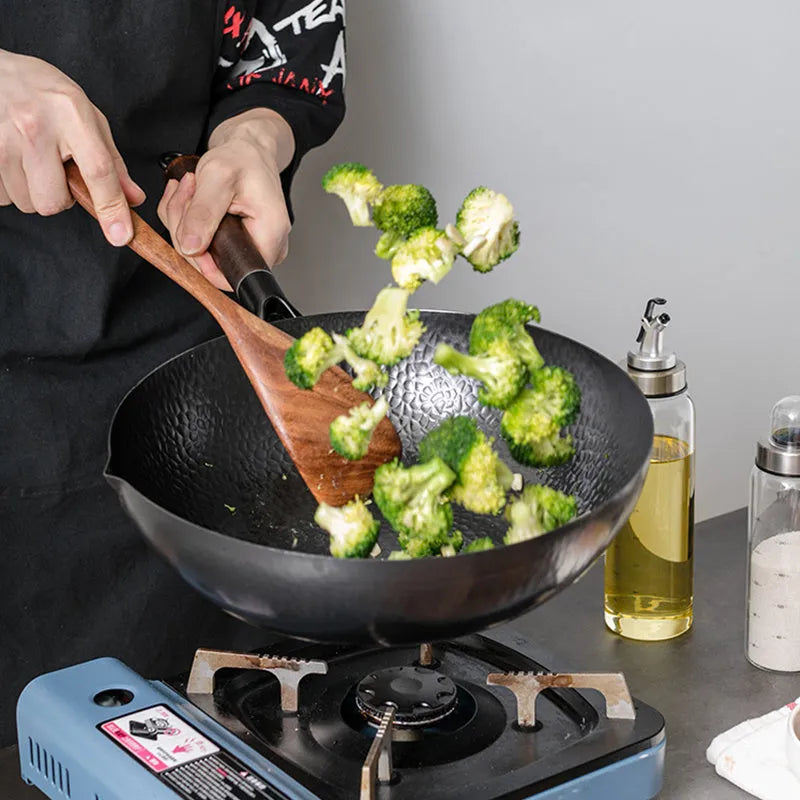 Traditional black iron wok with long wooden handle, 32cm cooking surface