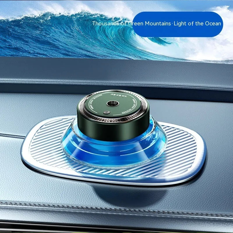 Smart Spray rechargeable car air freshener unit in black or green, with 50ml refill bottles for Ocean and Gulong scents.
