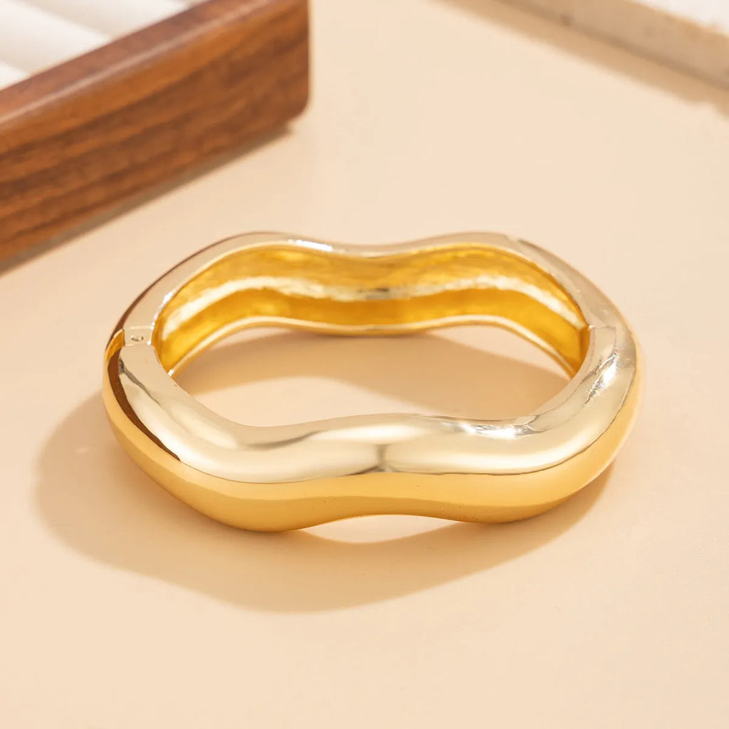 Punk metal texture ellipse pattern wide spring bracelet for women gold finish