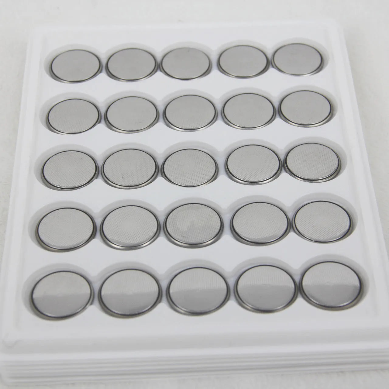 Pack of 3V alkaline button batteries showing CR2032, CR2025, and CR2016 models.