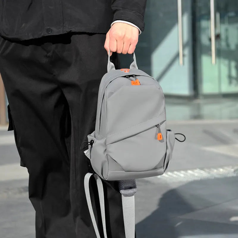 Men's black casual crossbody bag made from waterproof polyester with single shoulder strap