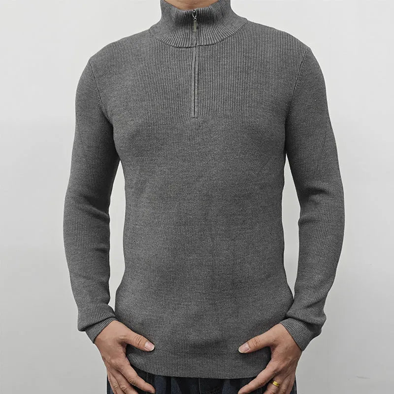 Men's black half-turtleneck zipper sweater pullover on a hanger.