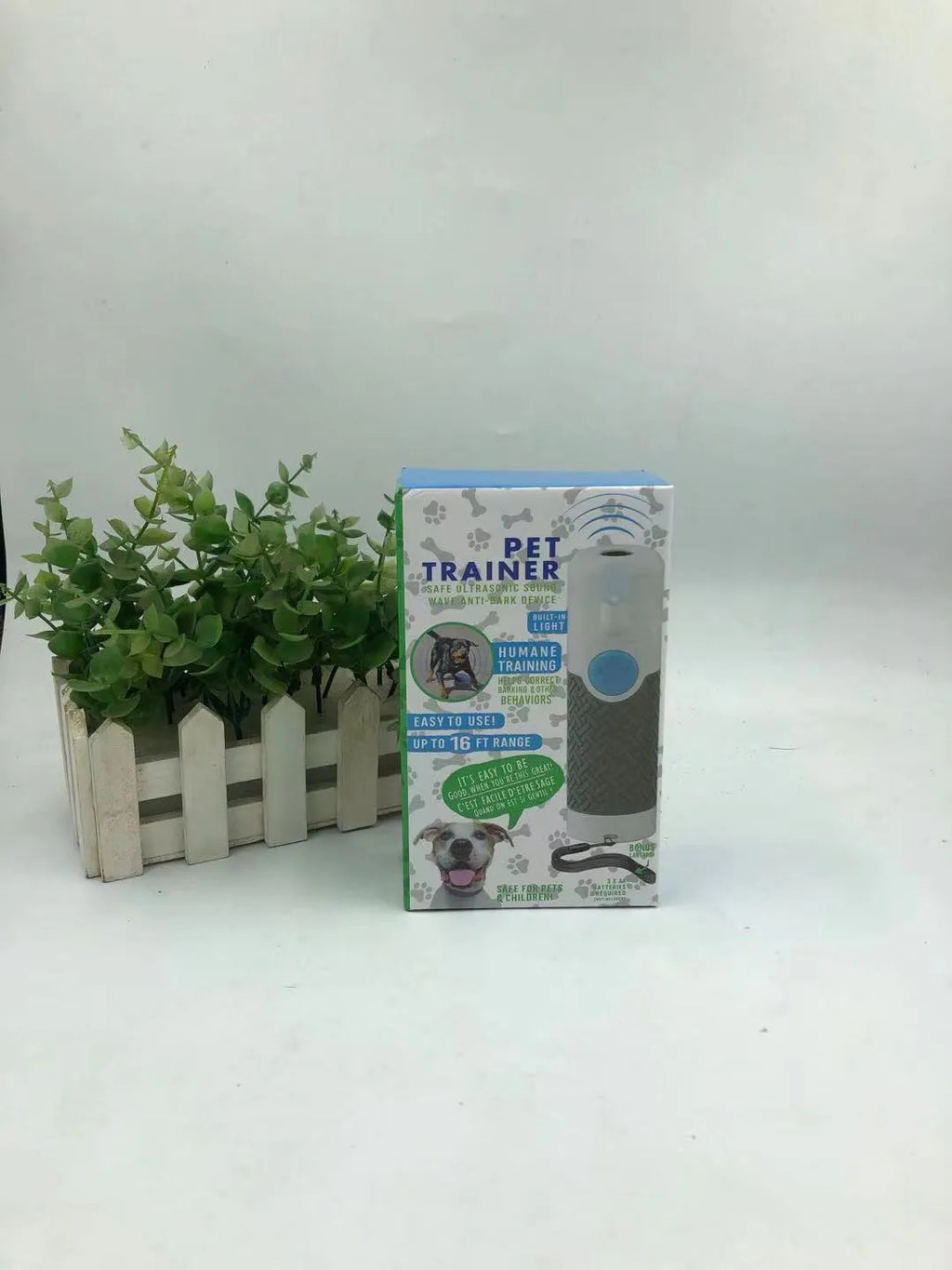 White handheld ultrasonic dog bark stop device with frequency adjustment controls
