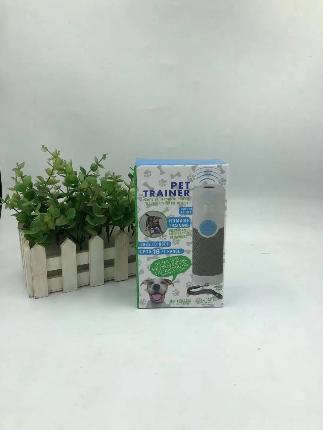 White handheld ultrasonic dog bark stop device with frequency adjustment controls