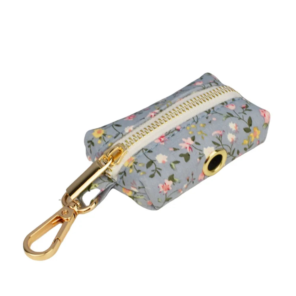Blue floral pattern dog collar set with matching leash, vest, bow and accessories for small dogs