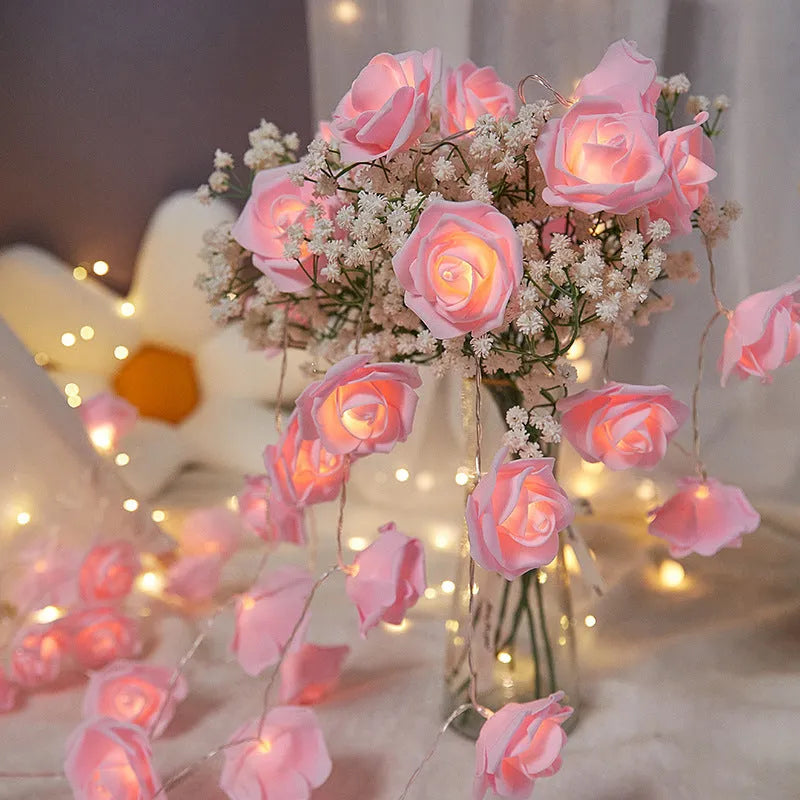 LED rose shaped coloured lights on 1.5m cable with battery power unit for indoor holiday decoration
