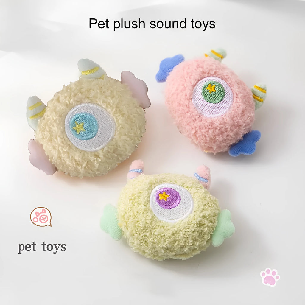 Cartoon-shaped plush dog chew toy with large eyes and squeaker in assorted colours