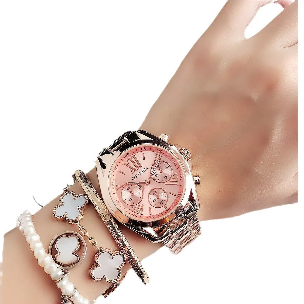 Women's silver and rose gold quartz watch with mesh strap and pointer display.