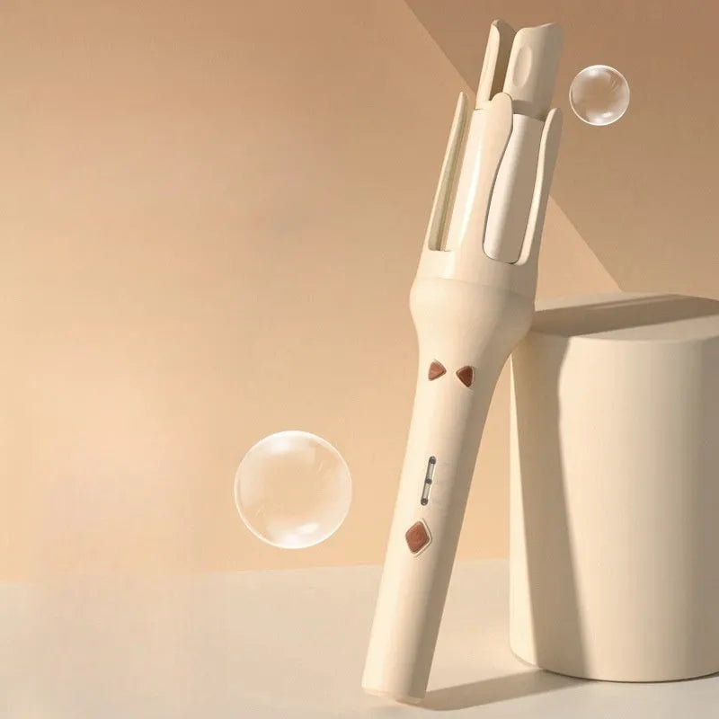 Automatic hair curler with a 32mm barrel in a two-tone colour option, shown with a plug adapter.