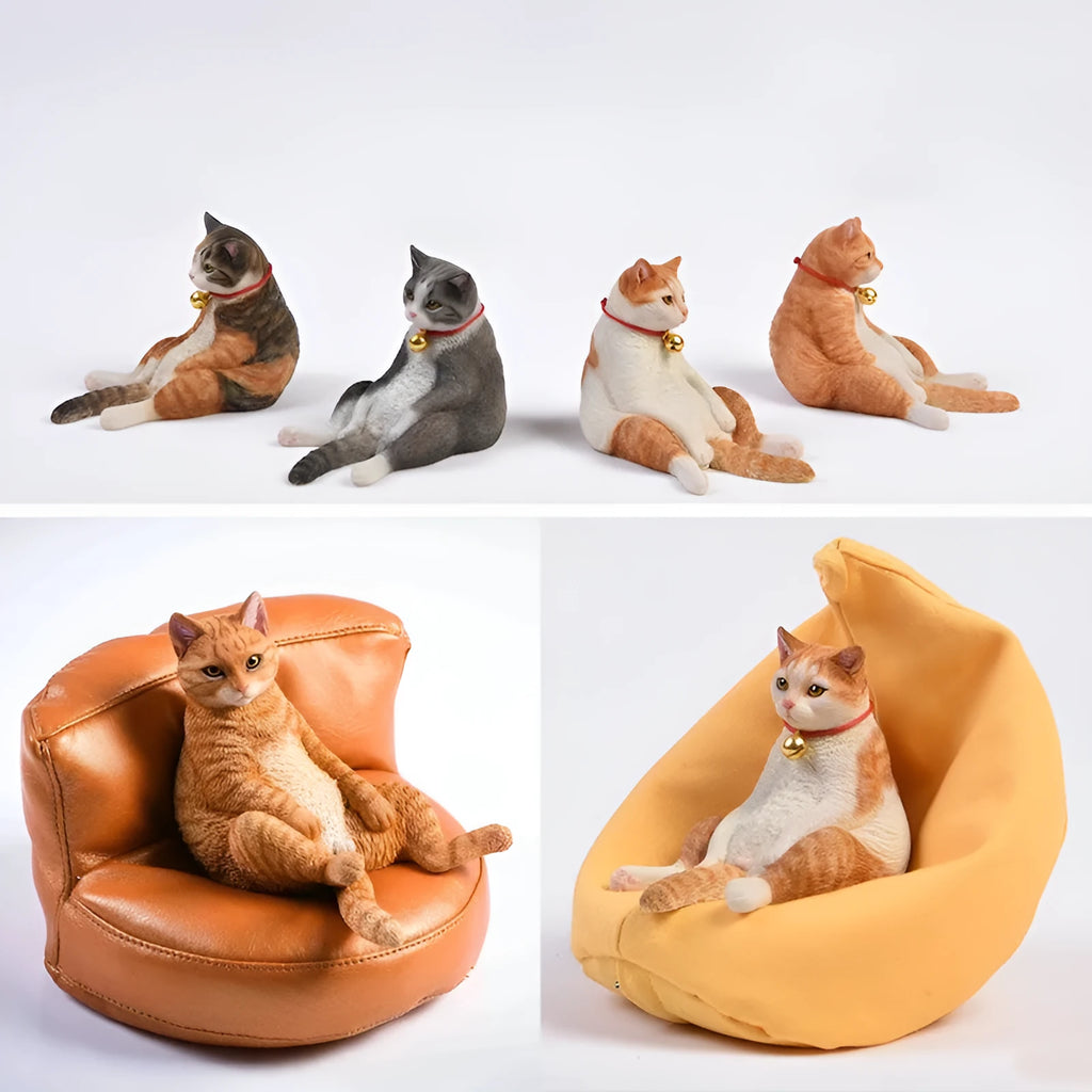 Resin lazy cat car ornament with fabric sofa, approximately 7.5cm high.