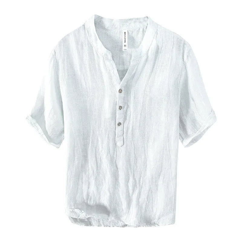 Retro-style linen pullover top in a solid colour with short sleeves, shown on a hanger.