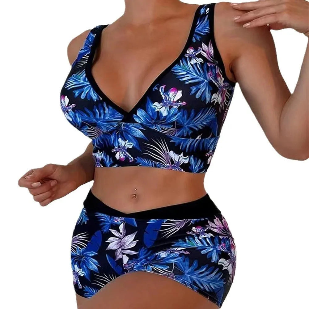Women's two-piece printed boxer swimsuit set in polyester on a mannequin.
