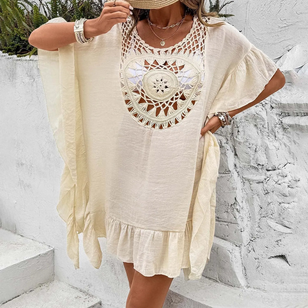 Apricot coloured beach dress with crochet stitching and tassel trim on patchwork skirt