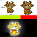 Pair of 9x5cm reflective warning stickers for cars and motorcycles showing sample graphic designs on diamond-grade film.