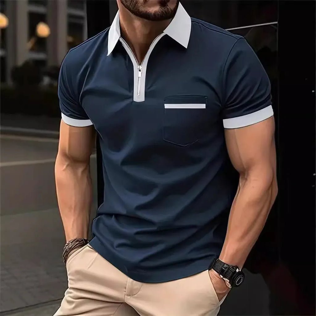 Man wearing a loose-fit short-sleeve casual shirt with a chest pocket and a zipper decoration on the front.