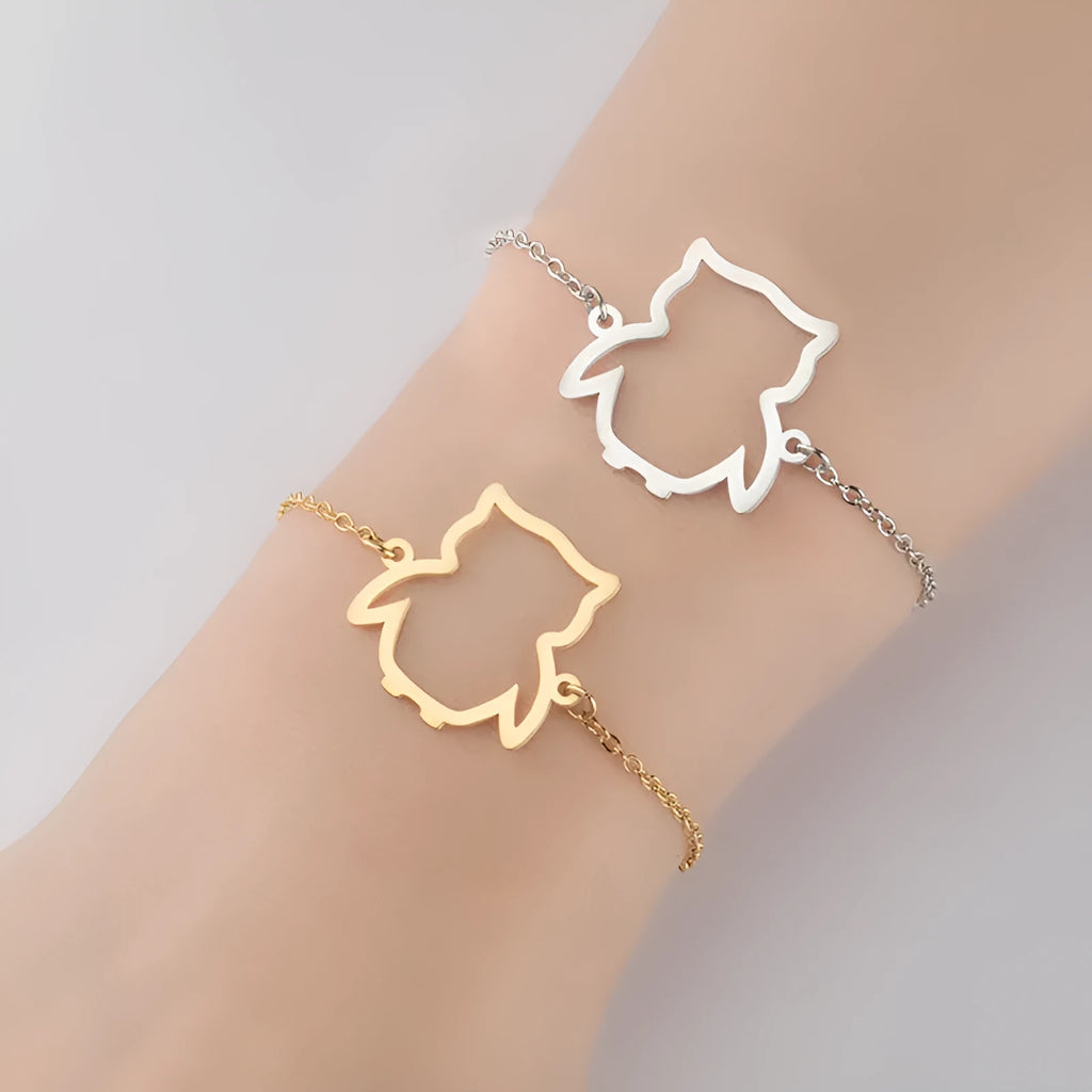Stainless steel bracelet with small hollow owl pendant on simple chain