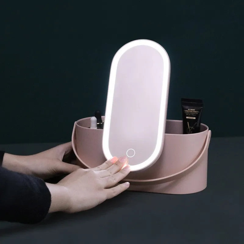 Portable pink and white beauty makeup mirror with storage box.