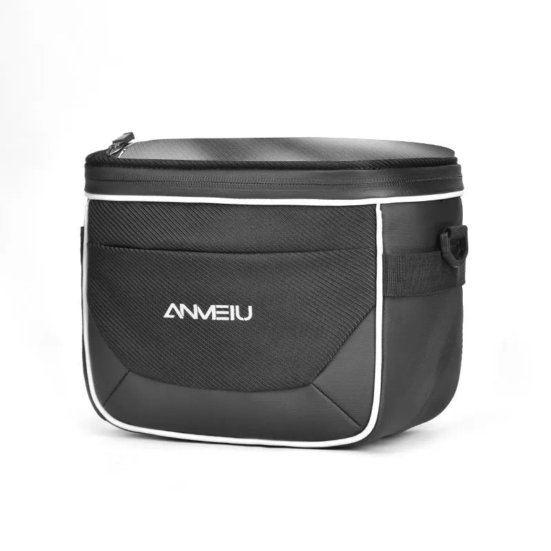 Black polyester bicycle handlebar bag with quick-release straps mounted on bicycle