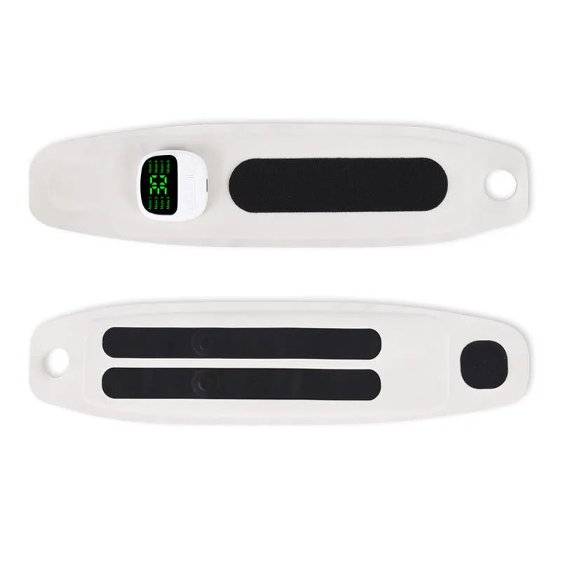 Wireless adjustable hand massage instrument with multiple coloured wristbands on a table
