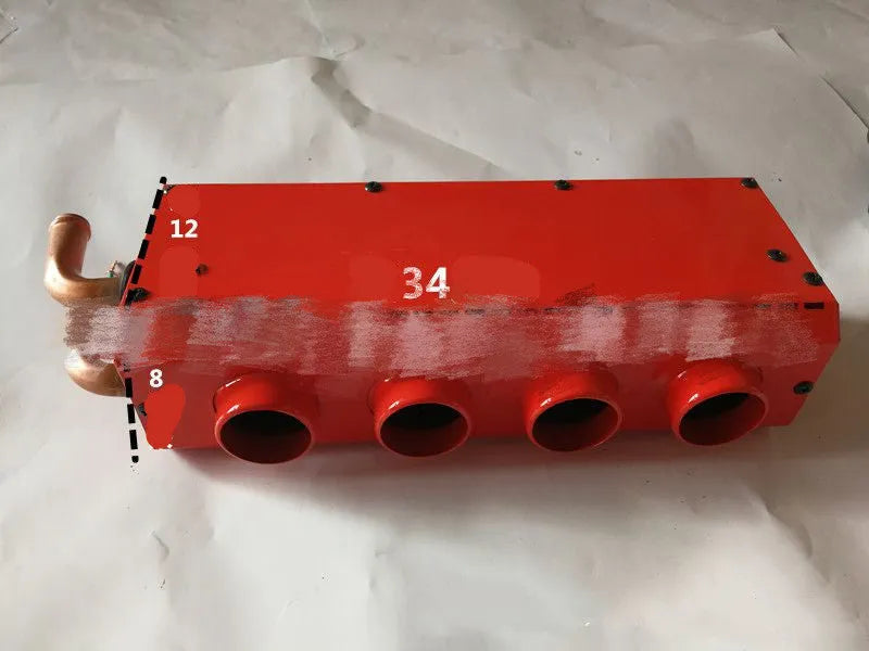 Small four-hole copper pipe car heater with metal housing and manual controls