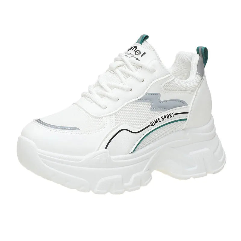 White women's lace-up dad shoes with cross straps and a breathable mesh upper.