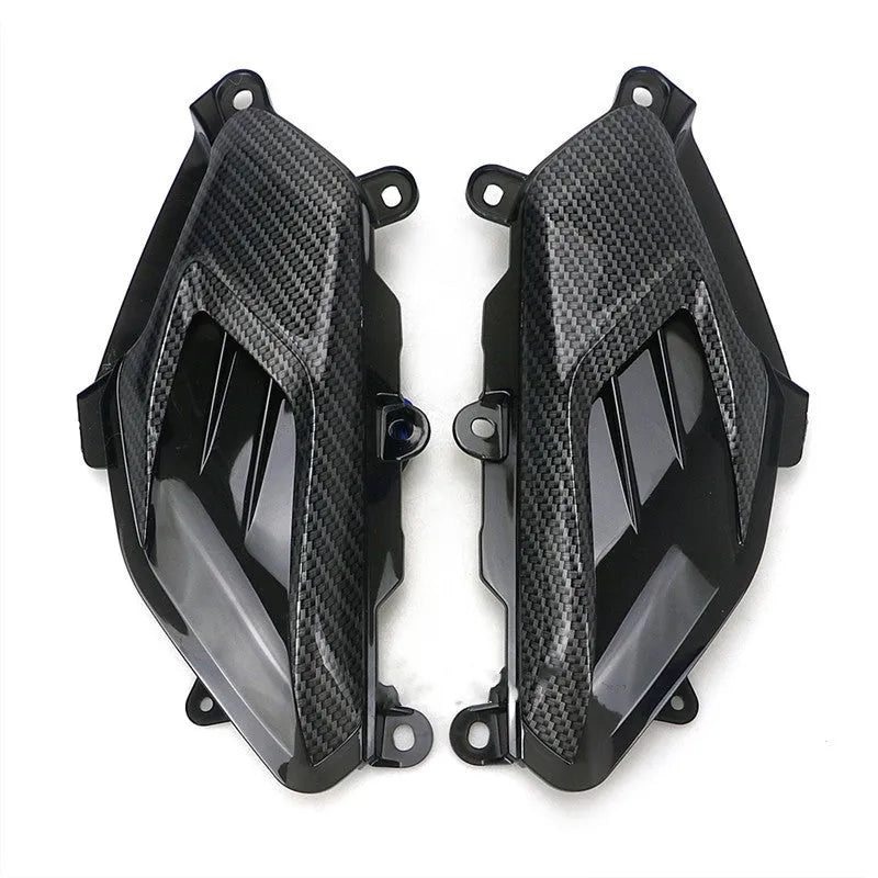Pair of YAMAHA NMAX carbon fibre style LED side lamps in blue or red.