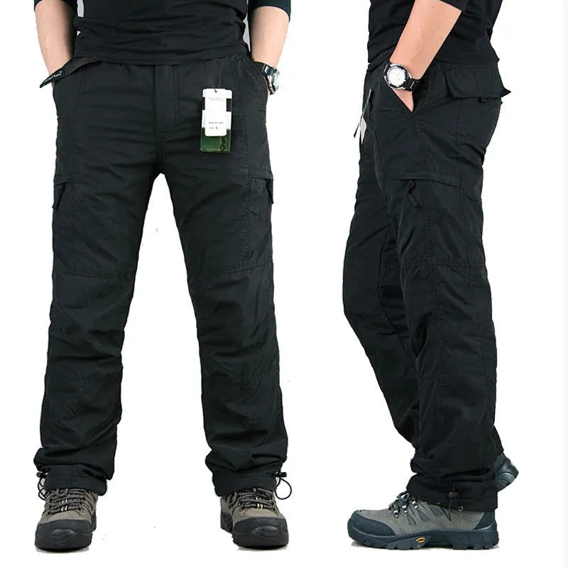 Men's khaki cotton overalls with velvet lining, showing loose fit and straight leg style