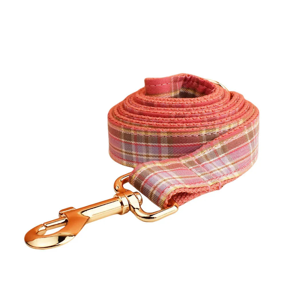 Plaid pattern cloth dog collar and lead set with matching bow and vest for special occasions