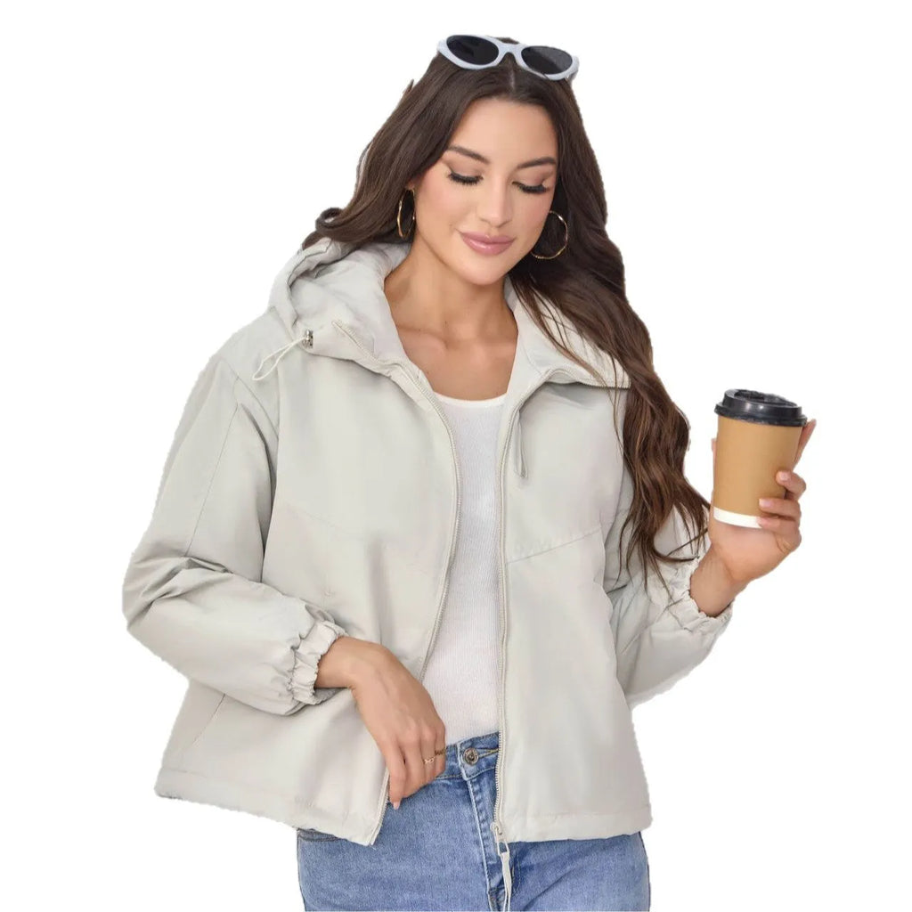 Women's hooded shell jacket in polyester available in grey, black, and purple with loose fit